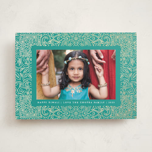 This is a turquoise diwali cards with foil pressed by Becky Nimoy called diwali medallions printing on signature in standard